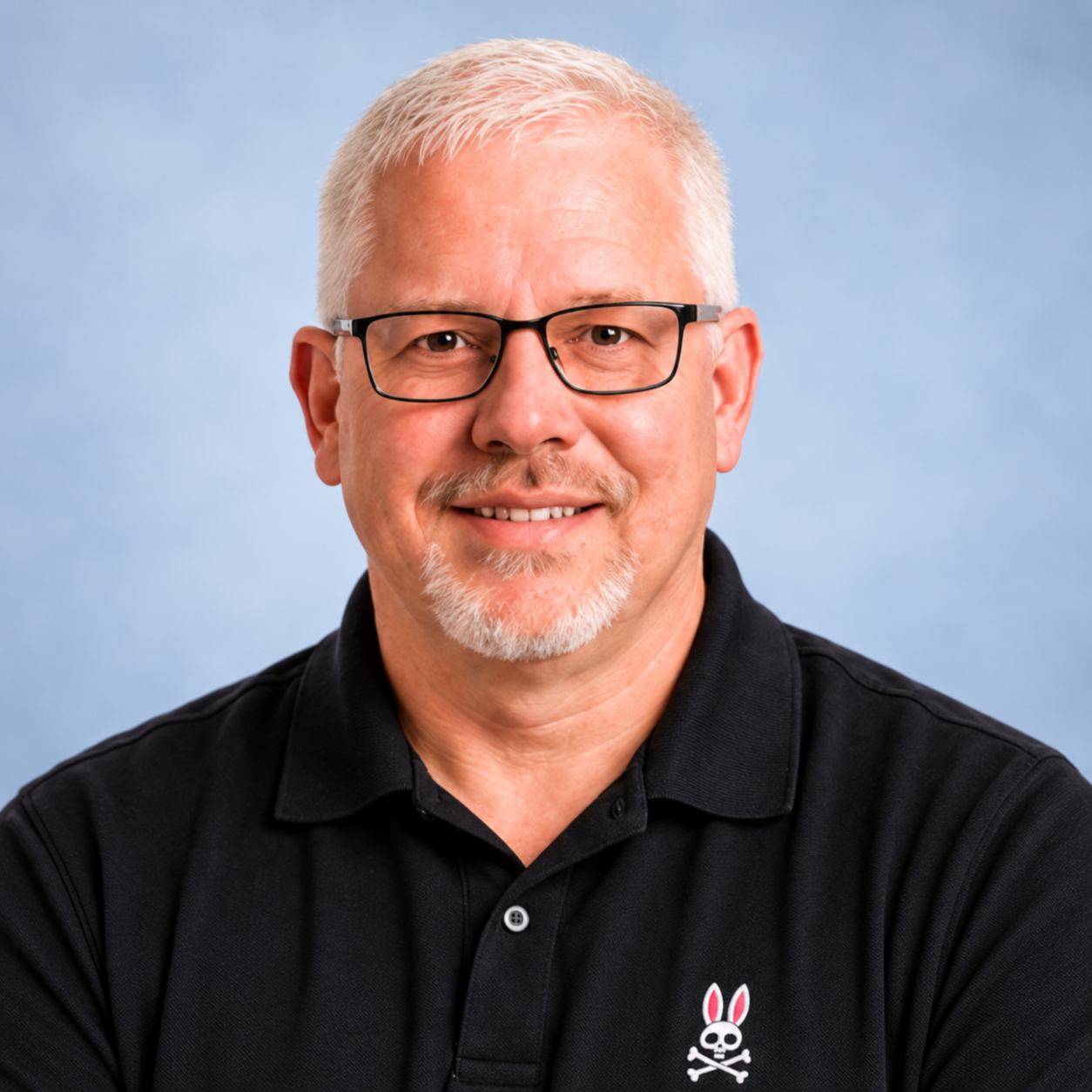 Mike Alkema, Michigan mortgage broker, in his current black-polo portrait